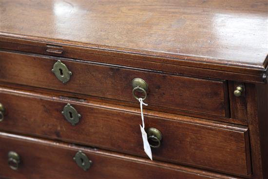 A George II red walnut bachelors chest, W.2ft 9in. D.1ft 1in. H.2ft 5in.